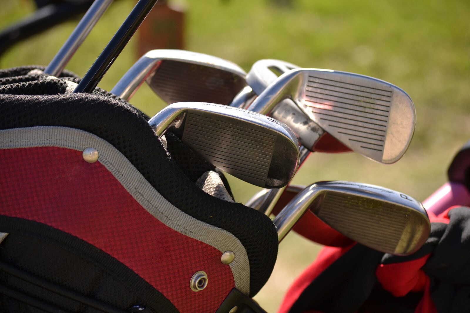 Golf clubs standing in a golf bag, illustrating the equipment to bring to a van viewing